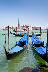 Fototapeta na wymiar gondolas and view on San Giorgio Maggiore in Venice