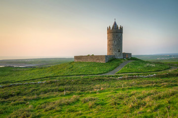 Fototapeta na wymiar Doonagore castle at sunset - Ireland