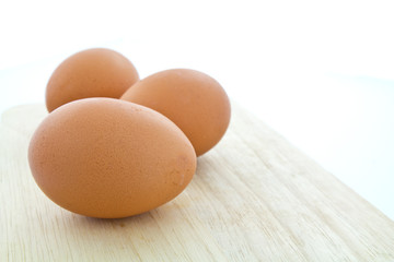 Eggs on chopping board