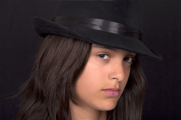 teenage girl with black hat