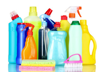 detergent bottles, brush and sponges isolated on white