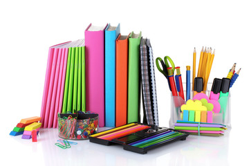 Fototapeta premium bright stationery and books isolated on white