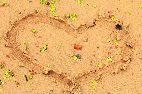 A heart made in the sand