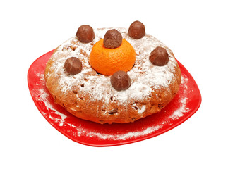 Round biscuit cake on plate, isolated on a white background