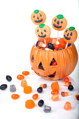 Halloween candy in pumpkin bowl