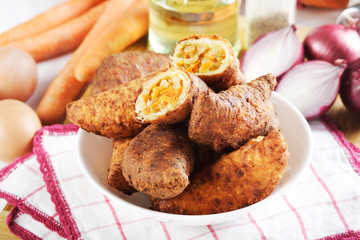 fried cakes stuffed with carrot
