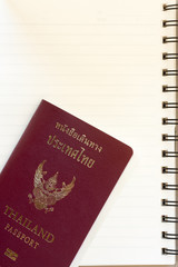 Thailand passport on notebook