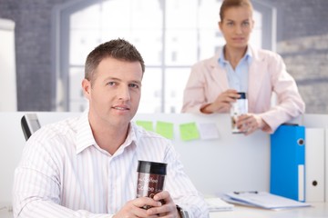 Casual office workers having break