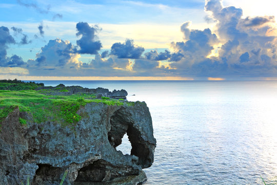 Fototapeta sunset with rock , Okinawa , Manzamo