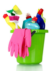 detergent bottles, brushes and gloves in bucket