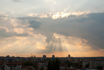 Sun rays over city