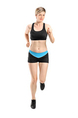 Full length portrait of a female runner