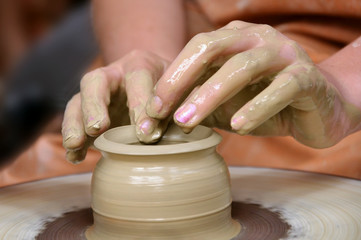 Clay pot on the wheel