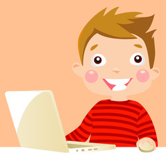 Boy on the computer. A child sitting on his desk in front of his computer, studying, playing and surfing the internet.