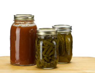 Three jars of homemade canned produce