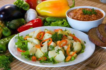 Boiled potatoes with vegetables