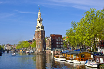 Fototapeta premium Classical Amsterdam view. Boat floats