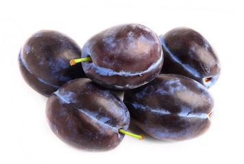 Plums isolated on white background
