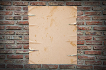 Old paper on brick wall, clipping path.