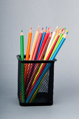 Colourful pencils on the background