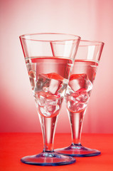 Water in the glass against gradient background