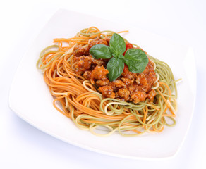 Colorful Spaghetti bolognese on a plate