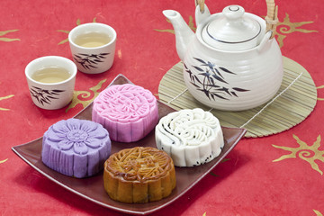 Four Mooncake on red background