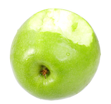 Single a green apple with bite