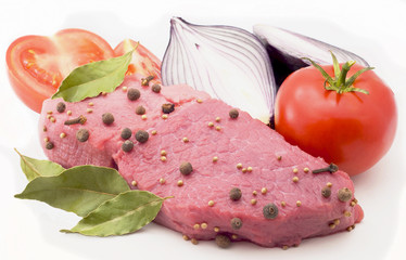 tomato,  onions, fresh beef on board ready to cook isolated