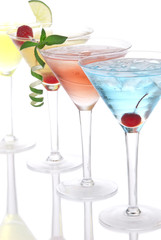 Martini alcohol cocktails in row blue hawaiia
