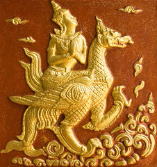 The Angle sit on a swan fly on the sky in traditional Thai style