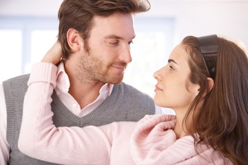 Closeup photo of young couple kissing