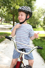 Obraz premium Young boy on a bicycle