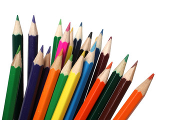 Many color pencils on a white background