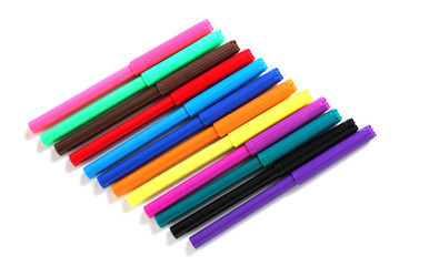 Many color felt-tip pens on a white background