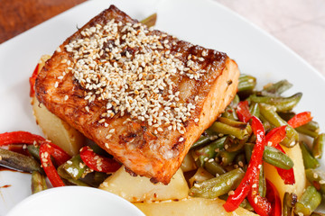 Fish steak with vegetables
