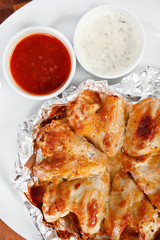 Chicken wings with sauce