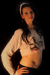 A Female Brunette Teen Posing For Camera