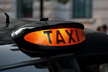 Fototapeten Illuminated London Taxi Sign © Jules_Kitano
