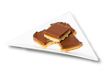 Millionaire's Shortbread on a Triangular Plate
