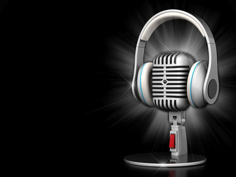 image of the old, chrome microphone on a black background