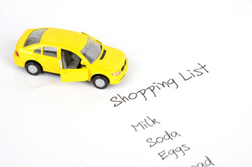Toy car and shopping list