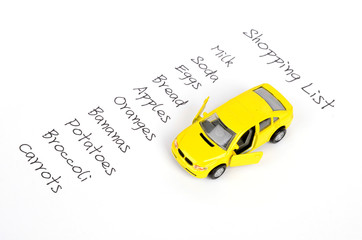Toy car and shopping list