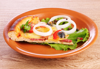 tasty pizza with olives on a wooden background