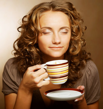 pretty woman drinking coffee