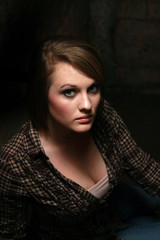Fototapeta premium A young woman in shadows