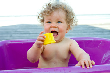 sweet baby in a bathtub