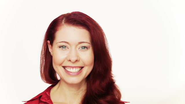 Smiling happy redhead girl