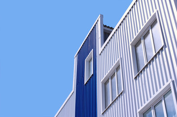 Fototapeta premium White and blue office building with windows