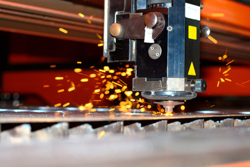 Industrial laser with sparks flying around